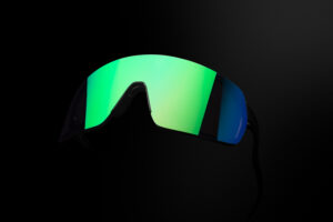 Sports sunglasses OUT OF Rams green on the black background